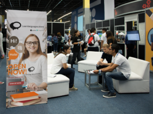"Image showing a person studying with GMAT preparation books and study materials, representing intensive one-month preparation for the GMAT exam."