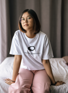 round-neck-tee-mockup-of-a-teenage-girl-with-glasses-in-her-bedroom-m4669-r-el2 (1)