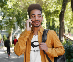 t-shirt-mockup-of-a-young-man-on-the-phone-while-on-his-way-to-school-m8255-r-el2